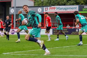 Boston United celebrate at Altrincham. Pic: Chris Bray.