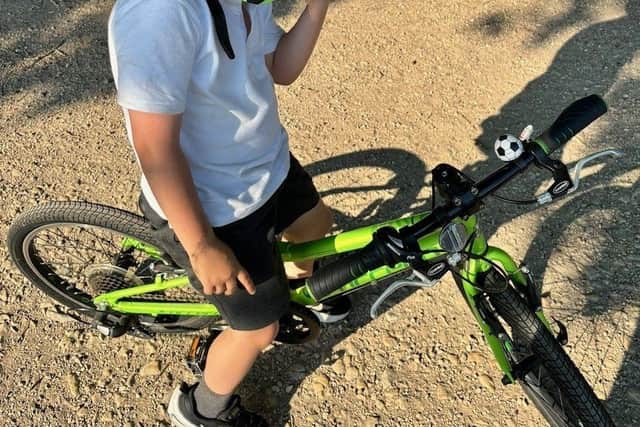 Oliver on his bike ready for the challenge