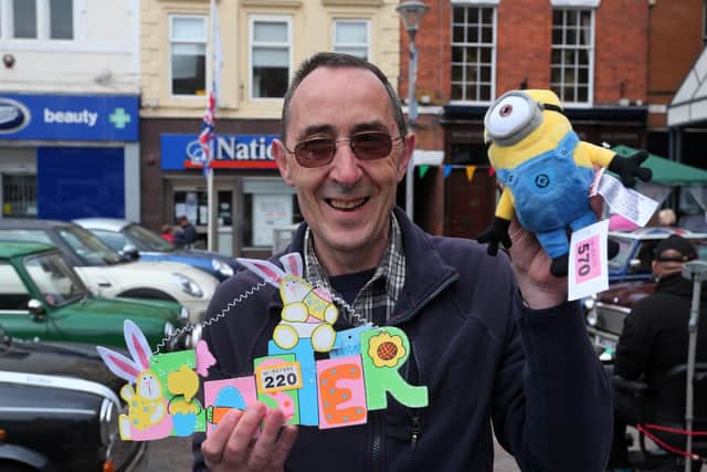 John Connor shows off his tombola winnings.