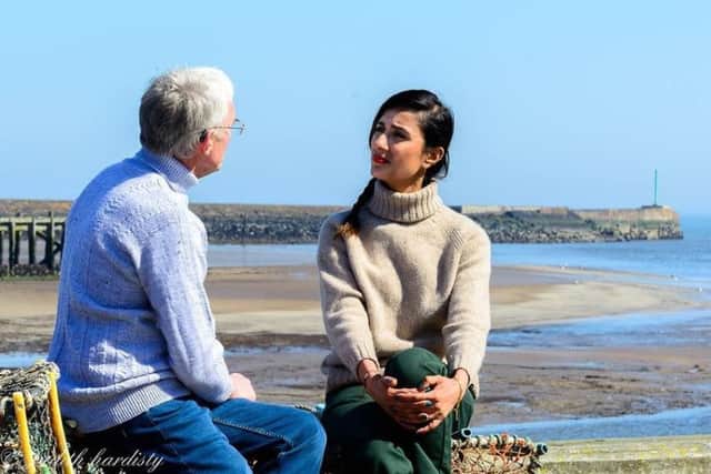 John Craven and Anita Rani filming BBC Countryfile in Amble