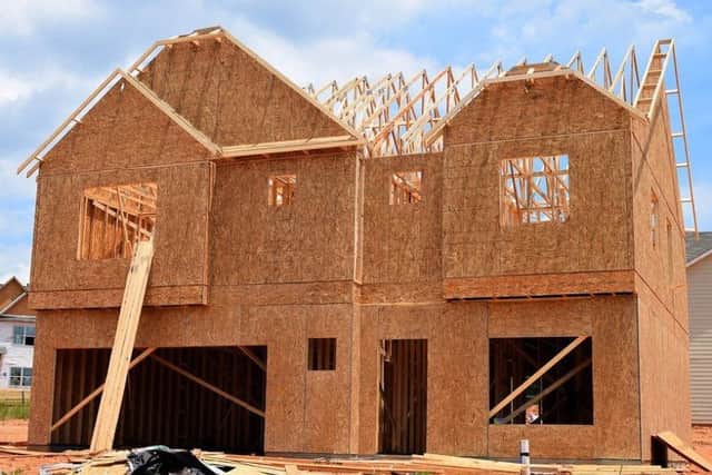 New homes under construction. Photo by Pixabay.