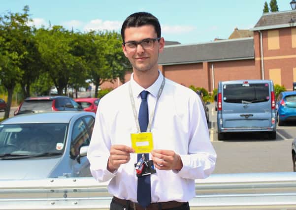 Luke Nelson (WLDC employee) with his permit.