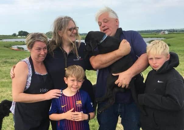Back from left: Vicky Crossland, Kate Ball, Rufus the dog and Tim Crossland. Front: Tim and Vickys sons Archie and Charlie.
