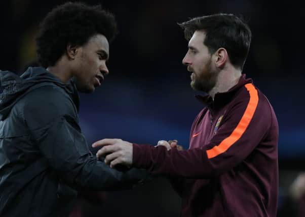 Chelsea midfielder Willian (left), who is the subject of a £65 million bid from Barcelona.