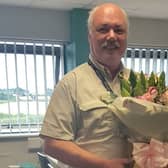 Gainsborough Heritage Society chairman Andrew Birkitt receiving a bouquet of flowers donated by Fabulous Flowers (on behalf of Gainsborough Life)