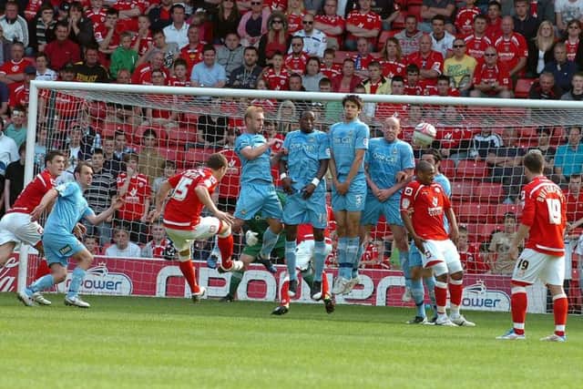 Kieran Tripper scores a late goal for Barnsley against Doncaster Rovers from a free kick in 2011.