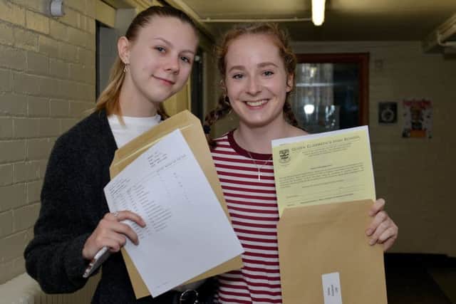 Students collect their A level results at Queen Elizabethâ¬"s High School, Gainsborough, pictured are Abby Marshall and Daisy Cookson
