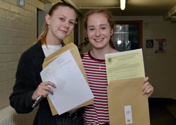 Students collect their A level results at Queen ElizabethÃ¢Â¬"s High School, Gainsborough, pictured are Abby Marshall and Daisy Cookson