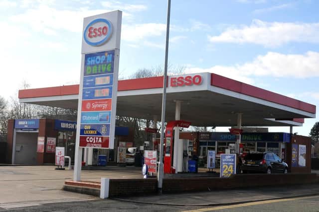 Is it illegal to leave your child alone in the car while you're at a petrol station?