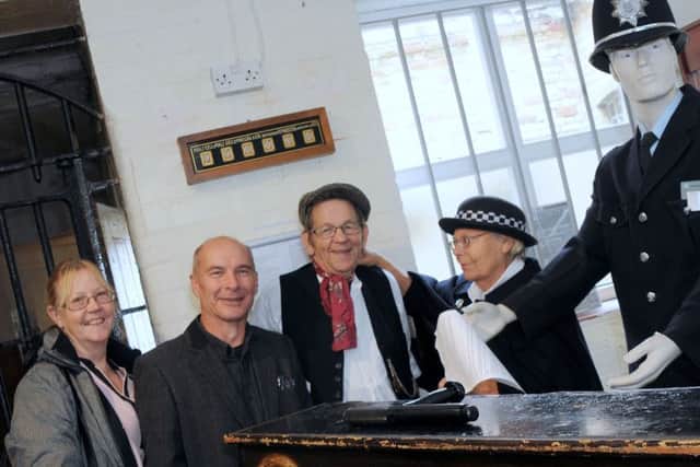 The Old Nick Open Day.
Valerie and Graeme Easter keeps an eye on Les Taylor who was 'apprehended' at the Old Nick by volunteer Eleanor Bowker during their open day on Saturday.