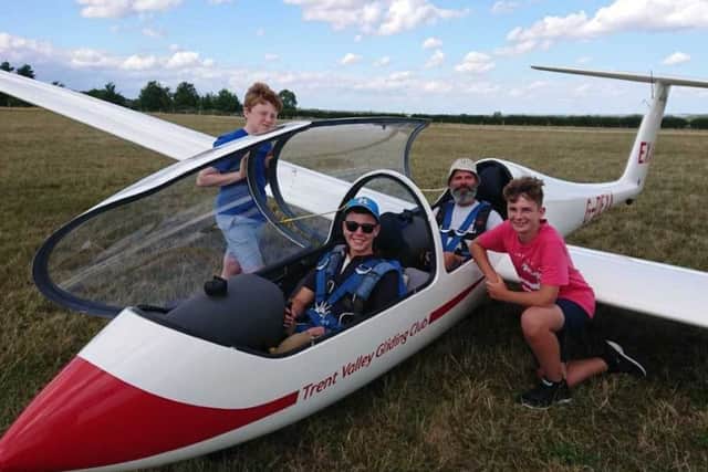 Oliver Goodhew, Bradley Lefley Kemp (cockpit), Charlie Baron, with instructor Larry Lawes.