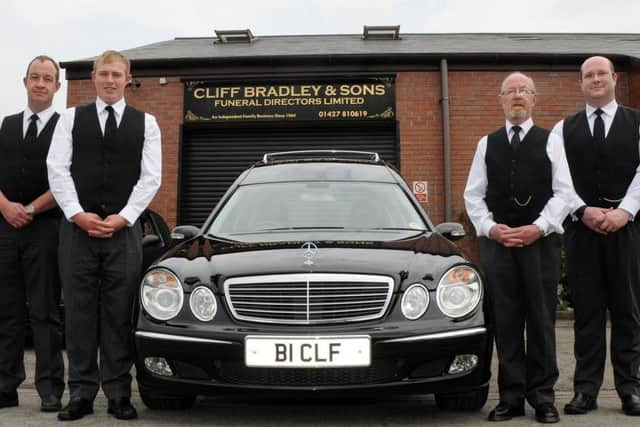Carlton Bradley (right) with three other key figures at Cliff Bradley and Sons, from left, Mannie Bradley, Edward Kliszcz and Cliff Bradley. (PHOTO BY: Andrew Roe)