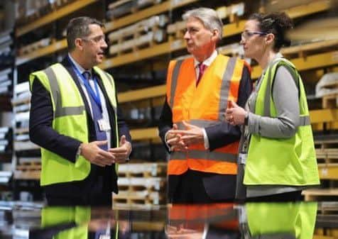 Chancellor Philip Hammond on his visit to Eminox.