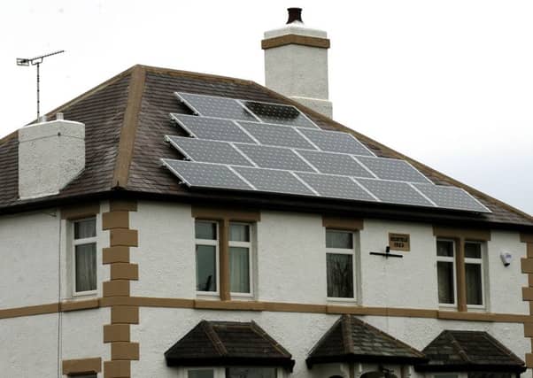 Solar panels are a popular way for households to harness greener renewable energy. Photo: PA/Rui Vieira
