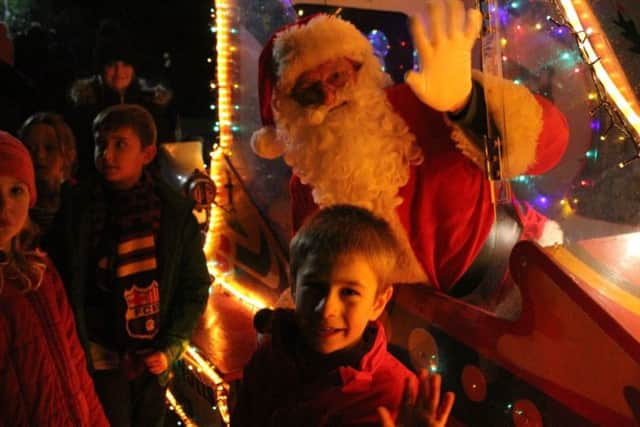 Santa arrives at last year's Christmas lights switch-on in Misterton.