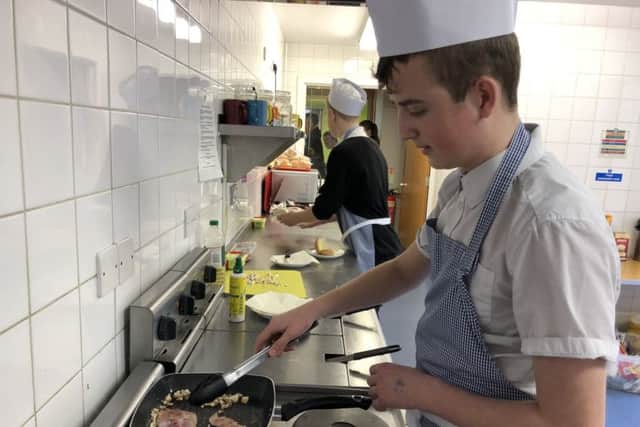Pupils hard at work in the community cafe at Gainsborough Uphill Community Centre.