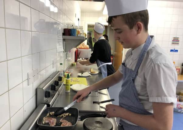 Pupils hard at work in the community cafe at Gainsborough Uphill Community Centre.