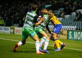 Mansfield Town's CJ Hamilton takes on the Yeovil defence. (PHOTO BY: Chris Holloway)