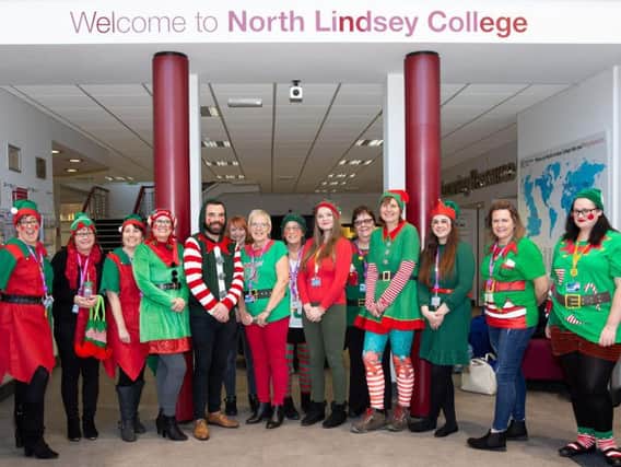 Julie and Emma Buttrick with supporters of their elf day