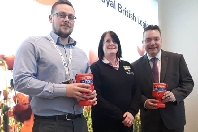 Kath Mitchell, General Manager at Notcutts Ashton Park Garden Centre (centre), with Lloyd Orr, Greater Manchester & Lancashire Royal British Legion (left) and Alan Whitmore, Community Fundraising Manager (North), Royal British Legion (right)