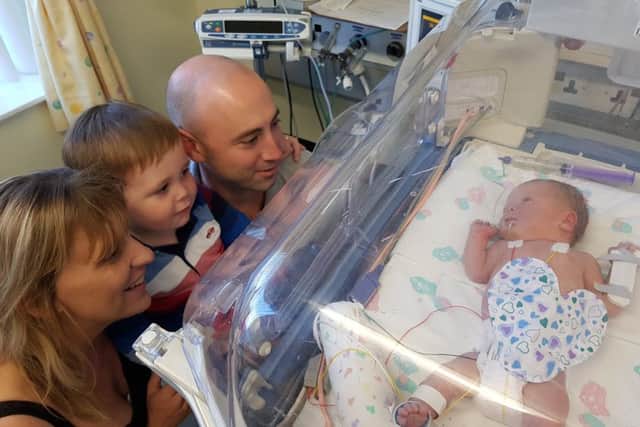 Louise and Philip Simmonds daughter, Charlotte, almost died after developing a group B Streptococcal infection.
