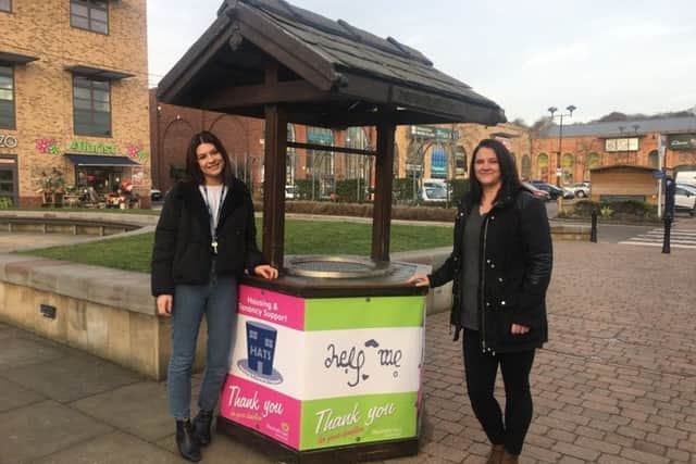 Natalie Markham, of HATS, and Helen Cousins, of Help Me, Im Fine, by the wishing well at Marshalls Yard.