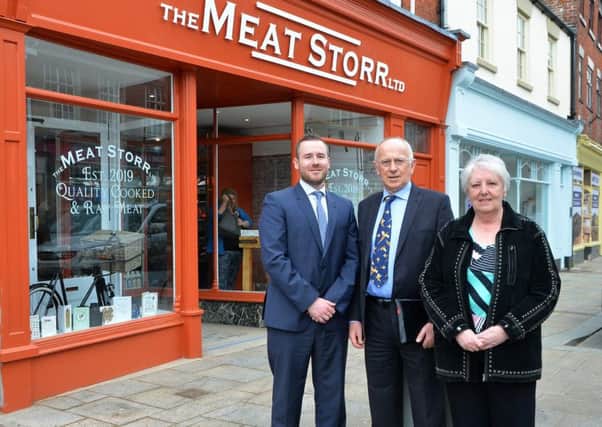 District councillors Jeff Summers and Sheila Bibb with Dave Hale, of Dransfield Properties, outside one of the new businesses.
