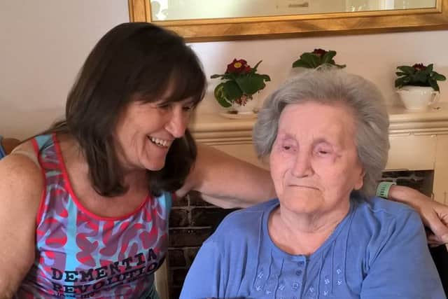 Denise Aitken with her elderly mother, Cath, who has inspired her to tackle a charity challenge.