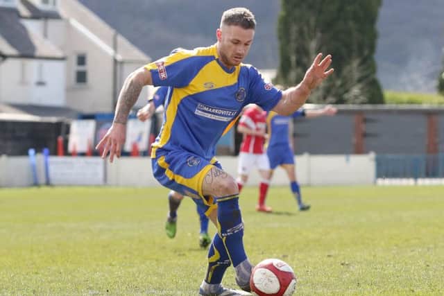 Top scorer Ash Worsfold, who fired two more goals in Trinitys win.
