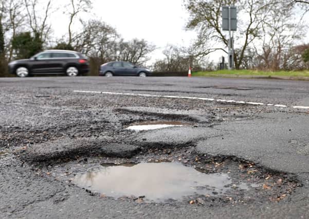 The kind of potholes that infuriate motorists.