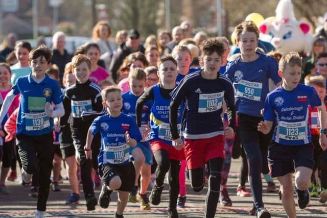 Excited youngsters at the start of last years junior fun run.