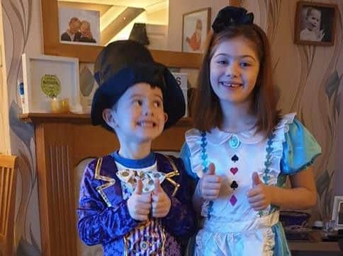 Freddie, five, and Tayla, seven, from Gainsborough as the Mad Hatter and Alice in Wonderland