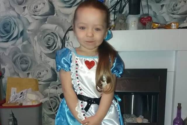 Kaidance, three, from Gainsborough as Alice in Wonderland