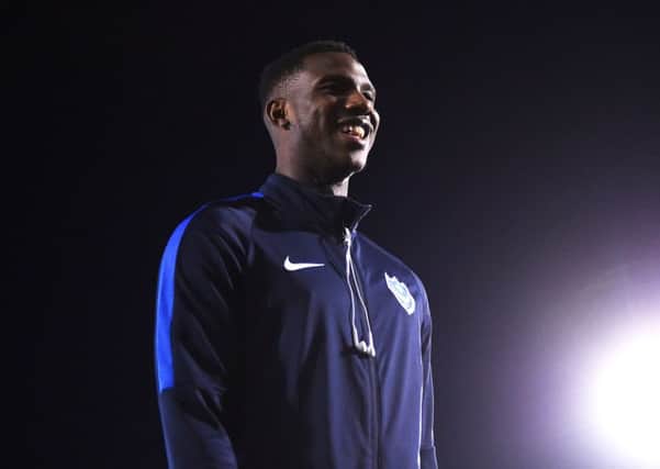BURY, ENGLAND - FEBRUARY 26: Viv Solomon-Otabor of Portsmouth inspects the pitch before the Checkatrade Trophy match between Bury and Portsmouth at Gigg Lane on February 26, 2019 in Bury, England. (Photo by Nathan Stirk/Getty Images)