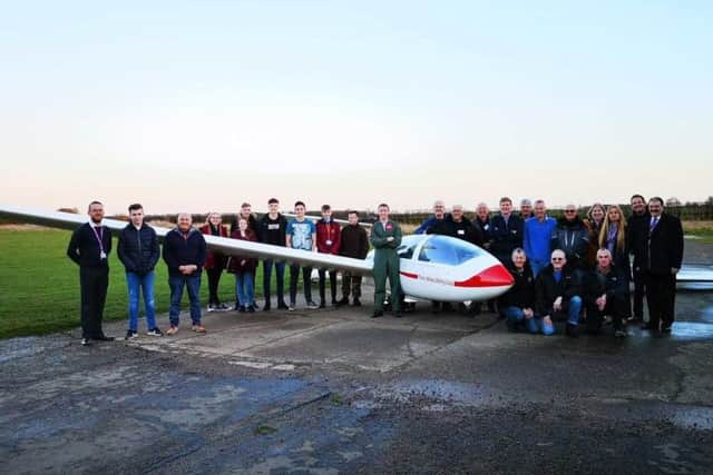Red 4 pictured with students, Trent Valley Gliding Club members and gliding instructors, representatives from North Lindsey College FE/HE University Centre, FORCE and the British Gliding Association.