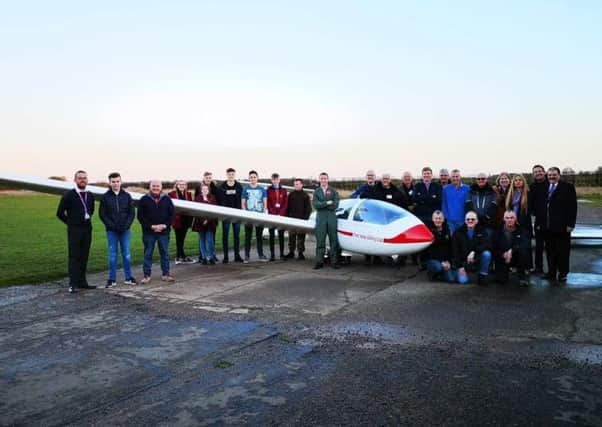 Red 4 pictured with students, Trent Valley Gliding Club members and gliding instructors, representatives from North Lindsey College FE/HE University Centre, FORCE and the British Gliding Association.