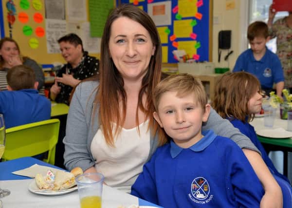 Motherâ¬"s Day afternoon tea at Willoughton Primary School,  Thomas Wright, five is pictured with Mum Louise Quin