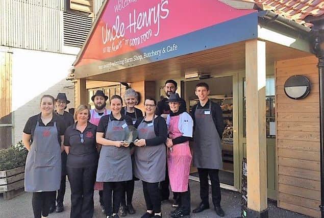 Uncle Henrys Team with the Supplier of the Year Award