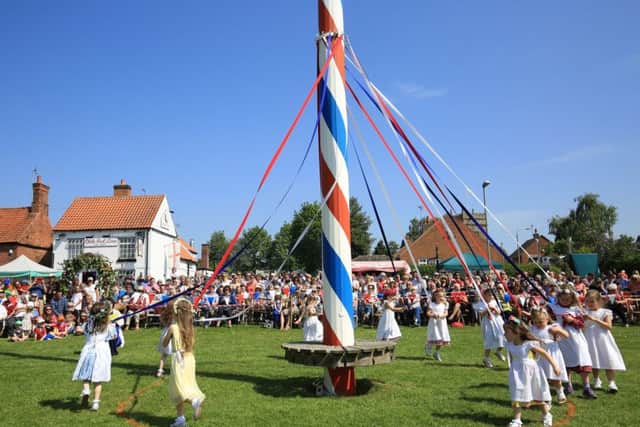 Maypole dancing is one of the traditions that marks the start of May. Photo: Chris Etchells