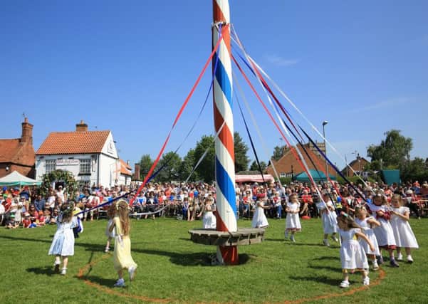 Maypole dancing is one of the traditions that marks the start of May. Photo: Chris Etchells