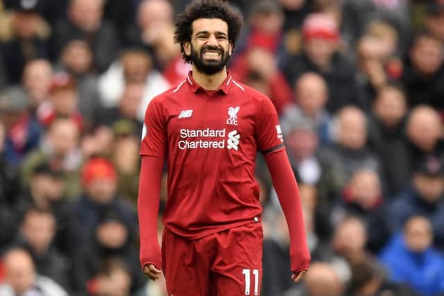 LIVERPOOL, ENGLAND - APRIL 14: Mohamed Salah of Liverpool reacts during the Premier League match between Liverpool FC and Chelsea FC at Anfield on April 14, 2019 in Liverpool, United Kingdom. (Photo by Michael Regan/Getty Images)