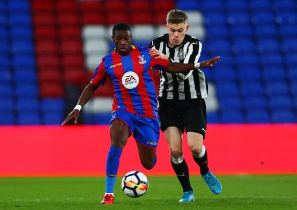 LONDON, ENGLAND - JANUARY 19: Joseph Hungbo of Crystal Palace avoids a challenge from Matty Longstaff of Newcastle during the FA Youth Cup Fourth Round match between Crystal Palace and Newcastle United at Selhurst Park on January 19, 2018 in London, England. (Photo by Jordan Mansfield/Getty Images)