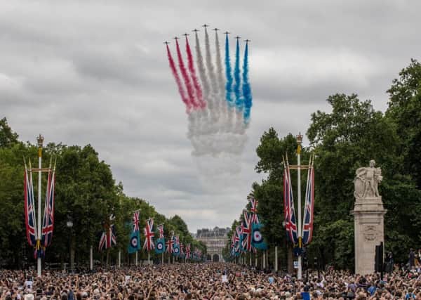 The Red Arrows aerobatics display team in action during the RAF 100th anniversary celebrations in London last year. (PHOTO BY: Ministry Of Defence, via Getty Images).