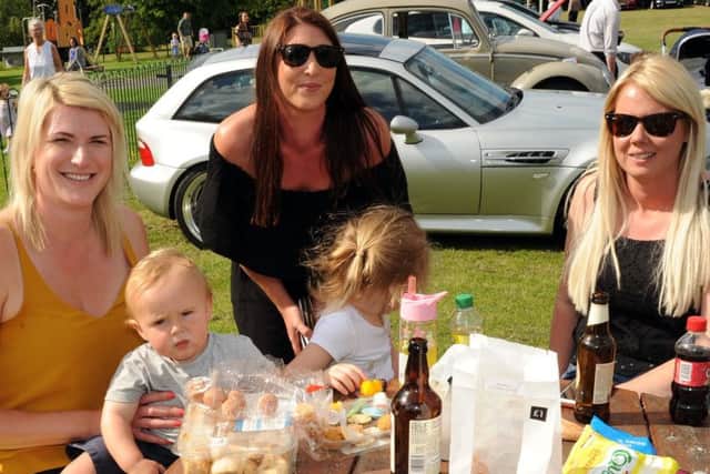 Visitors of all ages to the Picnic in the Park motor event.