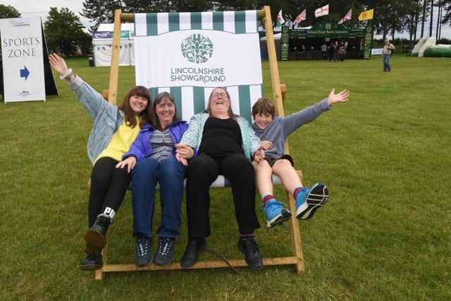 Lincolnshire Show. L-R Ellen James 16, Rosemary James, Sue Beers and Nathan James 10, 3 generations of family, enjoying the show.