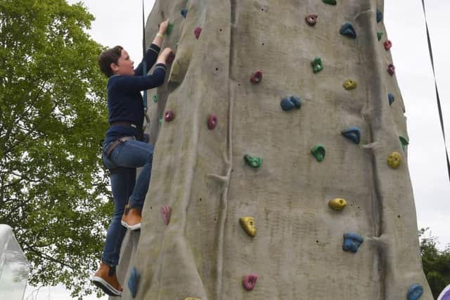 Lincolnshire Show. Matthew Carr 11 on the climbing wall.