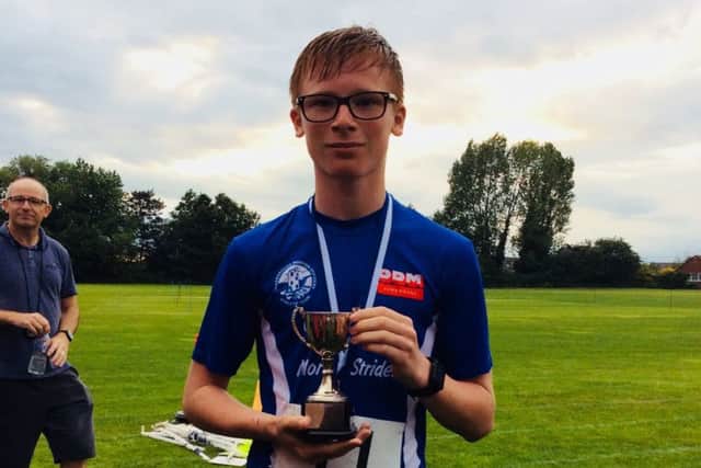 Joshua Cutts, the winner of the 5K fun run.