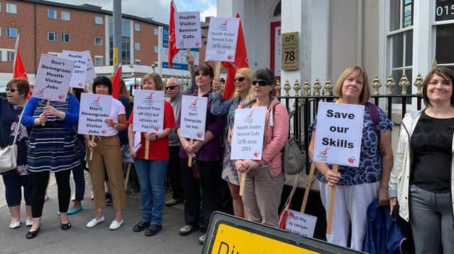 Health visitors protesting outside the offices of Lincolnshire County Council.
