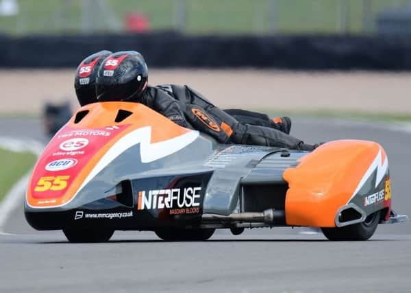 The sidecar-racing Staintons, Giles and Jen, in action at Anglesey.