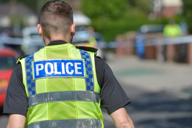 A man wasinjured with a knife after he was assaulted by four men
